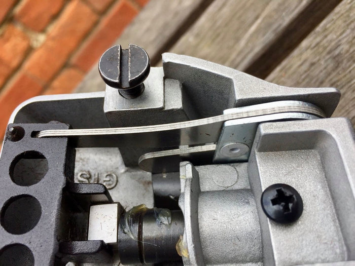 A close up of the laminated springs inside a clipper